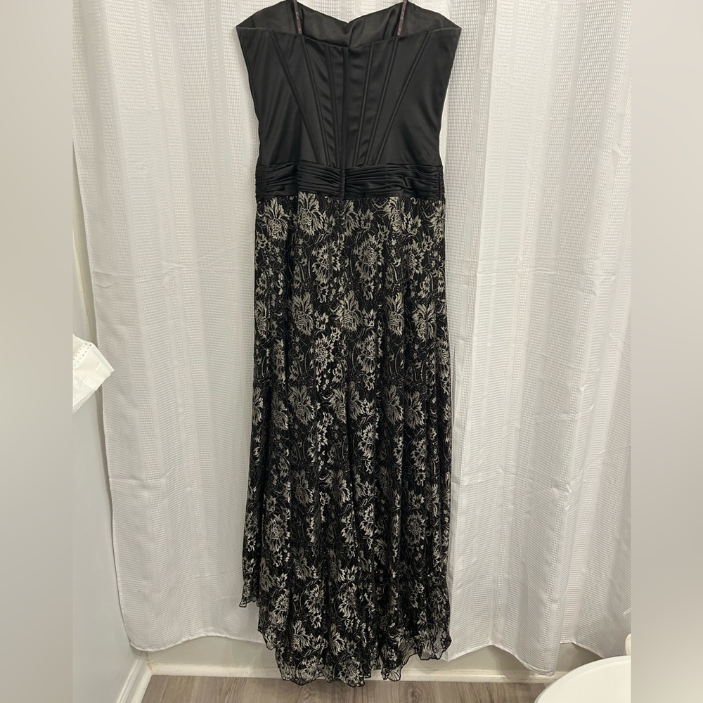 Camille La Vie Corseted Black and Gold Floral Lace Formal Gown - Picture 2 of 5
